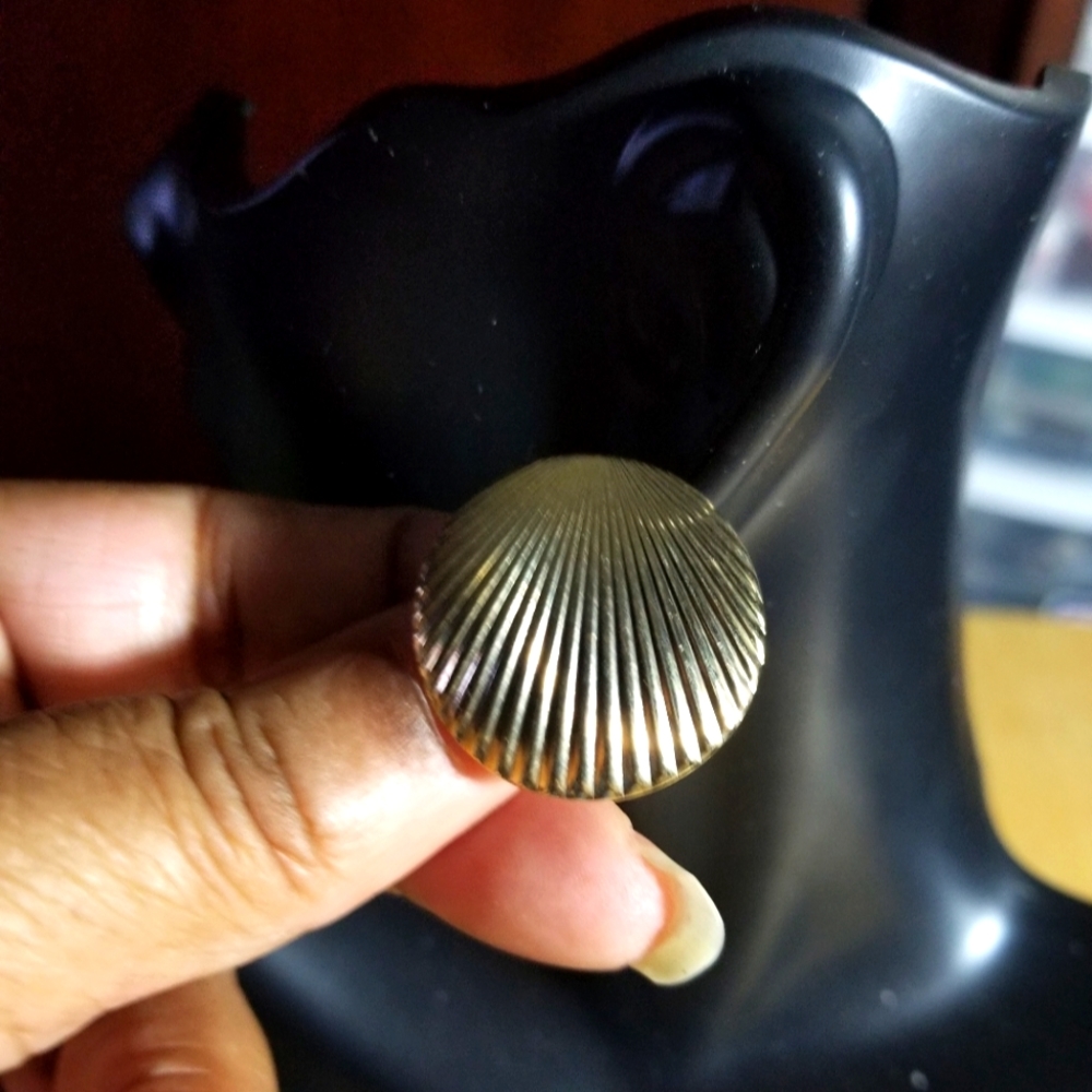 Round with character clip on earrings.